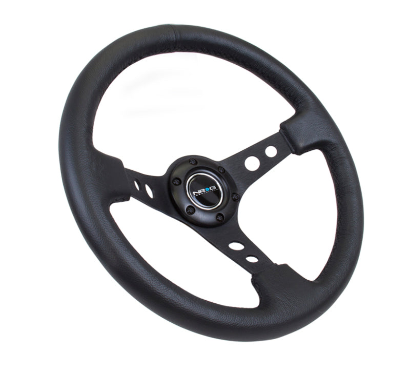 NRG Reinforced Steering Wheel (350mm / 3in. Deep) Blk Leather w/Blk Spoke & Circle Cutouts - Blais Performance Parts